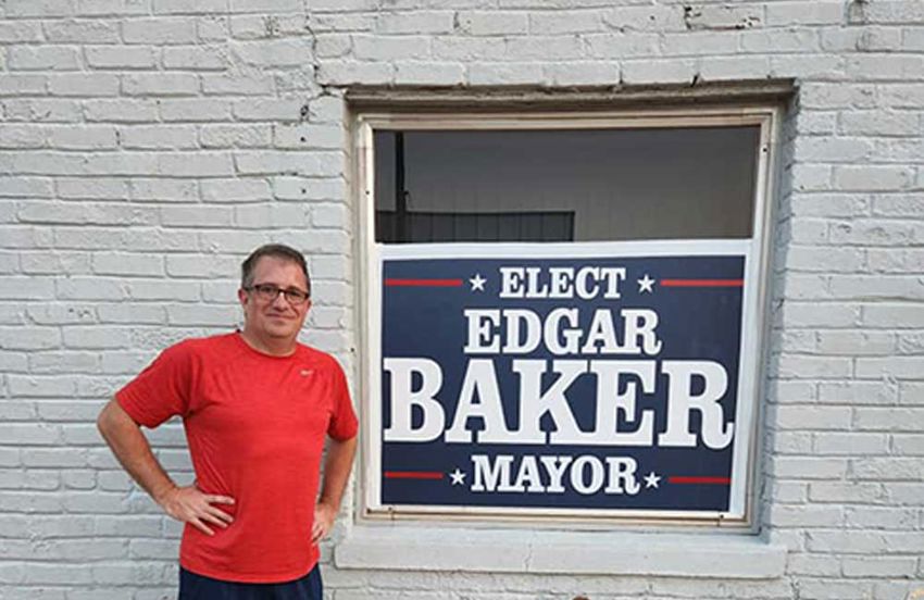 Elect Edgar Baker sign in window
